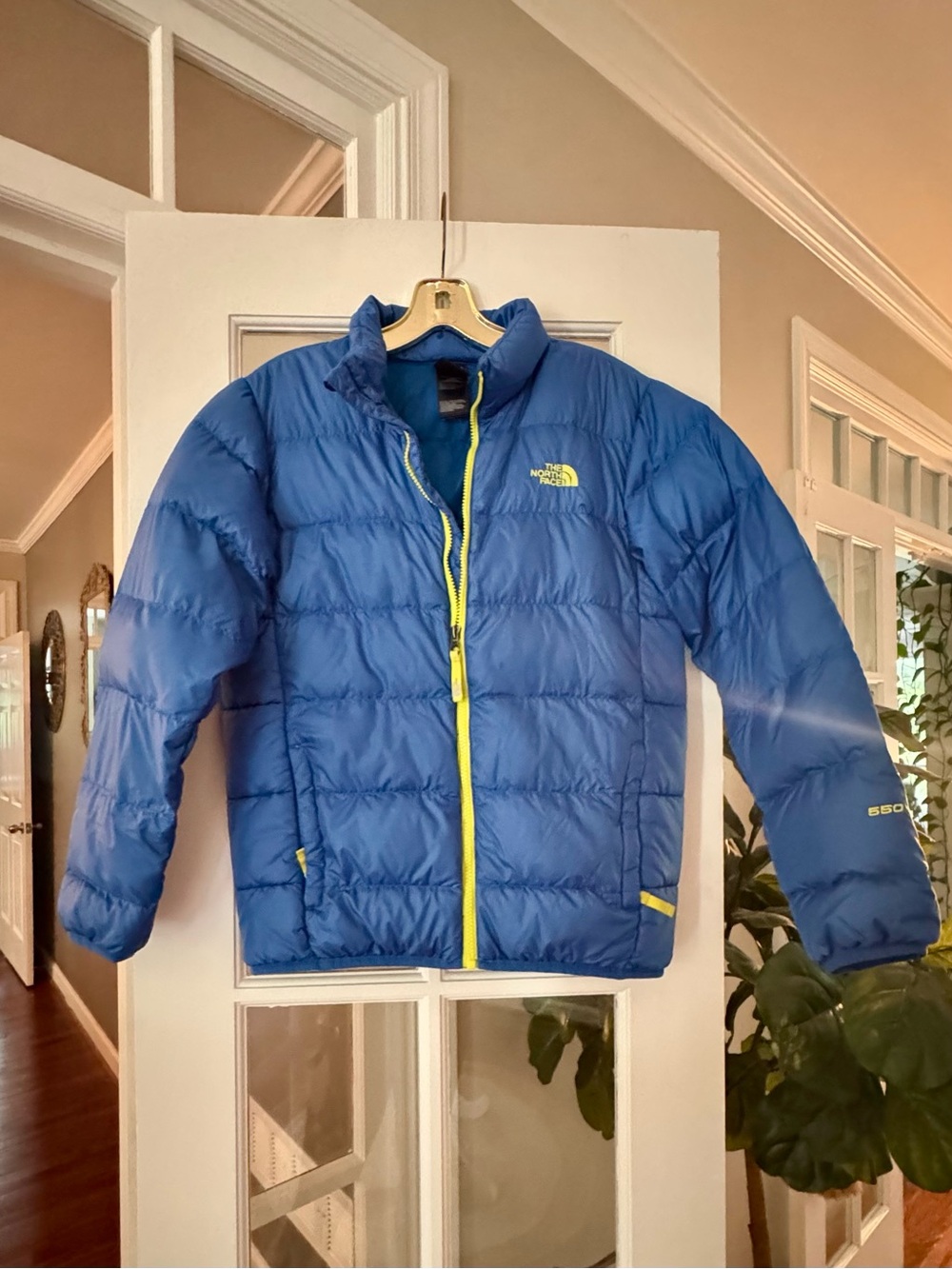 The North Face Blue 550 Puffer Jacket with Yellow Trim
